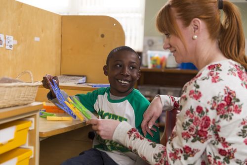 Teacher and Pupil in Special National School