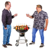 two men standing over a bbq holding a drink in their hand